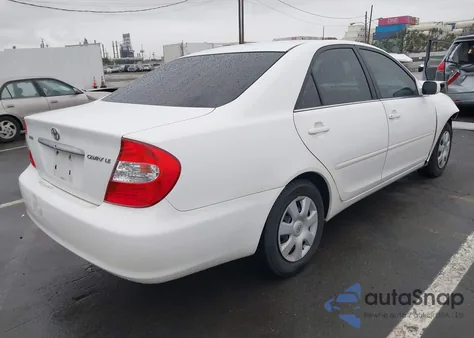 2003 Toyota Camry Le z USA, uszkodzony, nr VIN 4T1BE32K43U158134